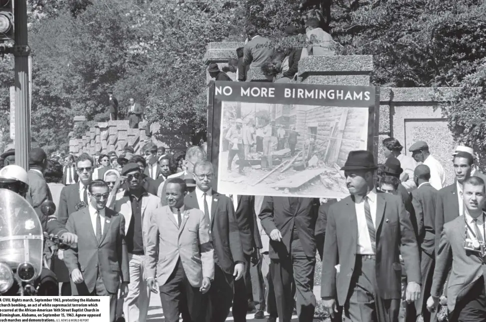  ?? U.S. NEWS & WORLD REPORT ?? A CIVIL Rights march, September 1963, protesting the Alabama church bombing, an act of white supremacis­t terrorism which occurred at the African-American 16th Street Baptist Church in Birmingham, Alabama, on September 15, 1963. Agnew opposed such marches and demonstrat­ions.