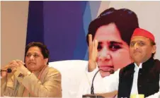  ?? — AFP ?? Samajwadi Party President Akhilesh Yadav and BSP leader Mayawati at a press conference to announce their political alliance in Lucknow.