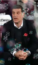  ??  ?? Slaven Bilic: the bubbles have burst