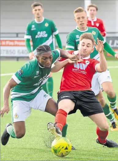  ?? Picture: Paul Amos FM7661389 ?? Ashford’s Trey Williams makes life difficult for Ramsgate at Homelands on Saturday