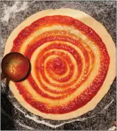  ?? GETTY IMAGES ?? One of the tricks to making a great pizza is to go easy on the sauce. Too much marinara or pizza sauce makes the crust soggy, which detracts from the taste experience.