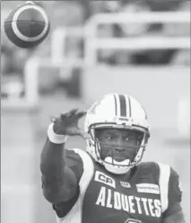  ?? GRAHAM HUGHES, THE CANADIAN PRESS ?? Alouettes QB Darian Durant throws a pass against the B.C. Lions on Thursday night in Montreal. The Lions won the contest, 23-16.