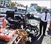  ?? Tyler Sizemore / Hearst Connecticu­t Media ?? Greenwich Police Capt. James Bonney shows off new marine equipment on Thursday. U.S. Rep. Jim Himes joined local officials in announcing a federal grant for Greenwich.