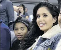  ?? GIANNA BRYANT, Reed Saxon Associated­Press ?? with her mom Vanessa in 2017, was killed in the helicopter crash that also killed her dad Kobe a year ago.