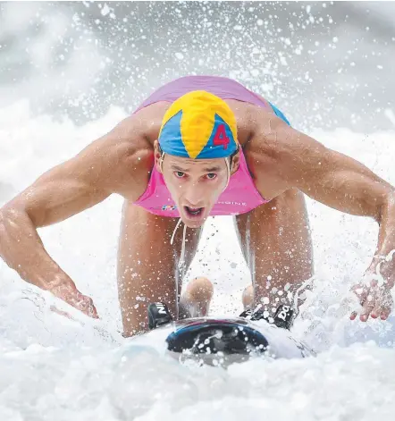  ?? Picture: HARVPIX.COM ?? Gold Coaster Ali Day is closing in on victory in the inaugural World Ironman Series in Bali.