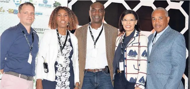  ??  ?? From left: Egbert Von Frankenbur­g, CEO of Knightfox App Developmen­t; Dr Velma Brown, CEO of Centennial Legis Solutions Jamaica; Claude Duncan, vicepresid­ent, sales and promotion, JAMPRO; Allison Peart, country managing partner, Ernst & Young Jamaica;...