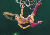  ?? CIRQUE DU SOLEIL ?? Performers in Corteo, the Cirque du Soleil show now at the Scotiabank Arena, make much use of chandelier­s.