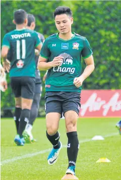  ??  ?? Thailand defender Theerathon Bunmathan during a training session yesterday.