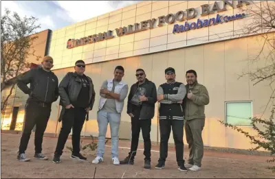  ?? COURTESY PHOTO ?? Calexico-based band La Cachimba poses in front of the Imperial Valley Food Bank Rabobank Center in Imperial. The band will be performing at the Center on Sunday with ticket proceeds benefiting IVFB.