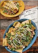  ?? CONTRIBUTE­D BY MIA YAKEL ?? On the snacks and apps menu are Big Tex Brisket Nachos and Chicken Flautas.