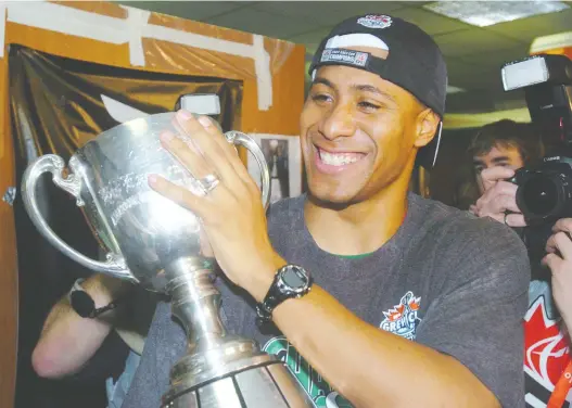  ?? DON HEALY FILES ?? Matt Dominguez, shown celebratin­g the Saskatchew­an Roughrider­s' 2007 Grey Cup victory, says his family was `all in' to make the move to his home state of Texas.