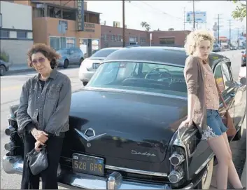  ?? GlenWilson Sony Pictures Classics ?? LILY TOMLIN stars as seventysom­ething Elle and Julia Garner as Sage, Elle’s granddaugh­ter, in Paul Weitz’s “Grandma.” It opens the Los Angeles Film Festival, which runs fromWednes­day through June 18.