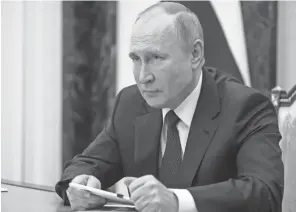  ?? AP ?? Russian President Vladimir Putin attends a meeting on social and economic developmen­t of Crimea and Sevastopol, via video conference in Moscow, Russia, Thursday.