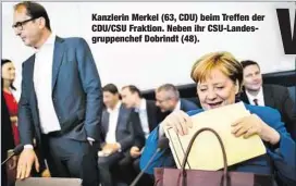  ??  ?? Kanzlerin Merkel (63, CDU) beim Treffen der CDU/CSU Fraktion. Neben ihr CSU-Landesgrup­penchef Dobrindt (48).