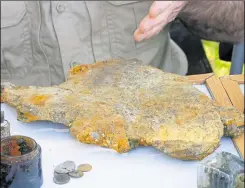  ??  ?? A large bomb fragment from the Second World War was pulled from the River Stour