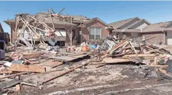  ?? AP ?? A home sits damaged in Norman, Okla., on Monday. The damage came after severe storms and tornadoes moved through Oklahoma overnight.
