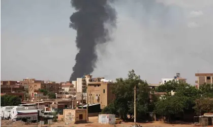  ?? ?? Smoke rises over Khartoum, Sudan. The Rapid Support Forces claims to have captured a key police base in Khartoum Photograph: AP