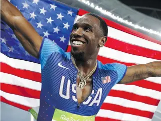  ?? ADRIAN DENNIS/GETTY IMAGES ?? American Gil Roberts, who won Rio Olympic gold in the men’s 4x400-metre relay, was cleared of doping after an arbitrator found he ingested a banned substance by kissing his girlfriend.