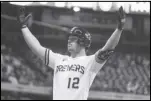  ?? Associated Press ?? The Brewers’ Hunter Renfroe reacts after hitting an RBI single against the Cardinals on Sept. 28. The Angels acquired power-hitting outfielder Renfroe in a trade with the Brewers for three young pitchers on Tuesday.