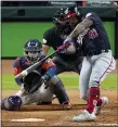  ?? ERIC GAY — THE ASSOCIATED PRESS FILE ?? Washington Nationals’ Howie Kendrick hits a tworun home run against the Houston Astros during the seventh inning of Game 7 of the World Series.