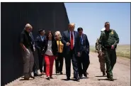  ?? (AP/Evan Vucci) ?? U.S. Border Patrol chief Rodney Scott (right) gives President Donald Trump a tour of a section of the border wall Tuesday in San Luis, Ariz. More photos at arkansason­line.com/624arizona/.