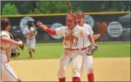  ?? SAM STEWART — DIGITAL FIRST MEDIA ?? Hazleton players celebrate after their win over Spring-Ford in the PIAA 6A softball semifinals Monday at Parkland High School.