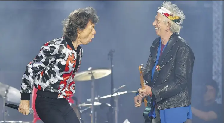  ?? MARK ALLAN/THE ASSOCIATED PRESS ?? Mick Jagger, left, Keith Richards and the rest of their Rolling Stones bandmates will roll through the U.S. next year as part of their No Filter Tour.