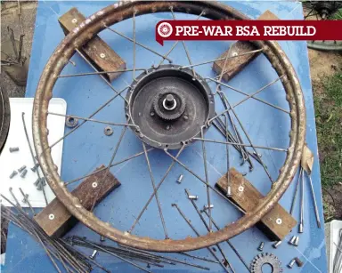  ??  ?? The front wheel hub and rim, set up in the taverner’s jig to work out the lacing pattern and spoke lengths