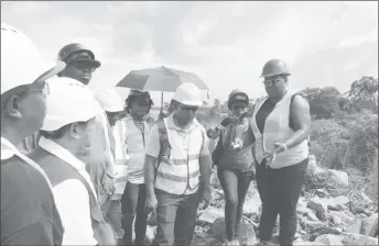  ?? (DPI photo) ?? Minister Simona Broomes (right) addressing TPL managers on safety compliance