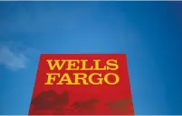  ?? (Jim Young/Reuters) ?? A WELLS FARGO branch is seen in the Chicago suburb of Evanston, Illinois, in 2015.