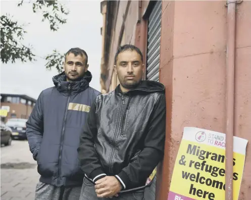  ??  ?? 0 Mirwais Ahmadzai, left, and Rahman Sahah on hunger strike outside the Home Office base in Glasgow