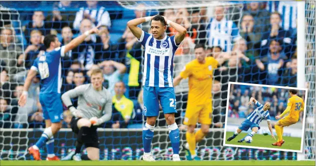  ?? PICTURES: Action Images ?? STALEMATE: Brighton's Liam Rosenior looks dejected during the game and, inset, team-mate Bobby Zamora in action with Adam Reach