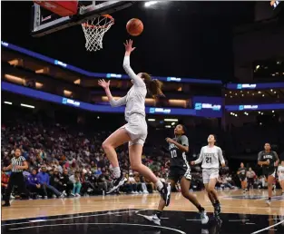  ?? JOSE CARLOS FAJARDO — STAFF PHOTOGRAPH­ER ?? Archbishop Mitty's Haley Hernandez (11) goes up for a lay up against Sierra Canyon during the CIF State Basketball Championsh­ips Open Division Girls game at Golden 1 Center in Sacramento on March 12. Sierra Canyon defeats Archbishop Mitty 85-61.