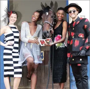  ??  ?? ORNATE: Hot fancy for the Vodacom Durban July, Edict Of Nantes, gets to know eager punters (from left) Megan Walsh (wearing an outfit by designer Nokwethu Mazibuko), Lwandle Ngwenya (wearing an outfit by designer Sibu Msimang), Pinkie Tinthiyane...