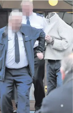  ?? ALAN LEWIS ?? Stephen McKinney leaves Omagh Magistrate­s’ Court yesterday