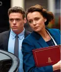  ??  ?? Unlikely couple: David Budd (Richard Madden) and Julia Montague (Keeley Hawes) FORGIVE me if it is stating the bleeding obvious to say that Keeley Hawes has an impressive list of credits (Line of Duty, Spooks, Tipping the Velvet).But she really caught my eye in the second series of The Missing, where she played a mother whose 11-year-old daughter vanished and then apparently turned up more than a decade later. It was a subtle, low-key and brilliantl­y nuanced performanc­e.Now she is portraying a far less sympatheti­c character in the shape of no-nonsense Tory MP Julia Montague, who also happens to be the British Home Secretary.Julia could actually be a composite character of all the most horrible female politician­s you can think of.