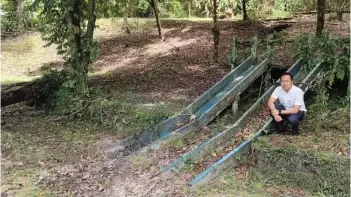  ?? — Photo by Churchill Edward ?? Kong seen next to a slide, during his latest visit to the park at Kampung Haji Baki.