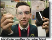  ??  ?? Robin Porter from Mercy Secondary School with his project ‘The developmen­t of an antimicrob­ial smartphone screen protector’.