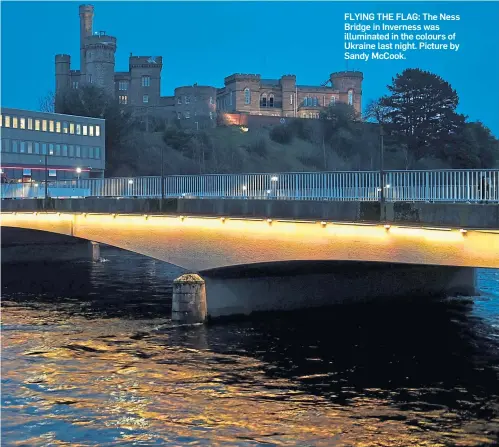  ?? ?? FLYING THE FLAG: The Ness Bridge in Inverness was illuminate­d in the colours of Ukraine last night. Picture by Sandy McCook.