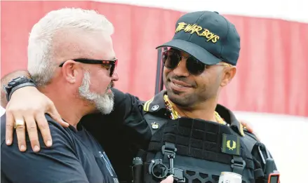  ?? JOHN RUDOFF/ANADOLU AGENCY 2020 ?? Joe Biggs, left, and Enrique Tarrio, leaders of the right-wing, pro-Trump Proud Boys, are on trial for seditious conspiracy.