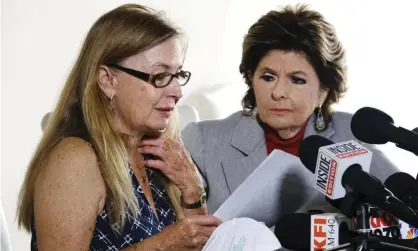  ?? ?? Mamie Mitchell reads a statement, left, joined by her attorney Gloria Allred on Wednesday. Photograph: Richard Vogel/AP