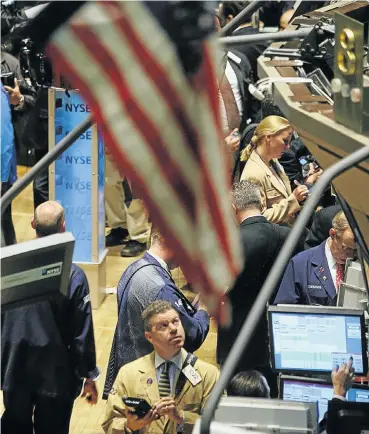  ?? Picture: Bloomberg via Getty Images/Dima Gavrysh ?? Almost all trading on the New York Stock Exchange is now done by highly skilled profession­als, making it hard for fund managers to outperform the market, says leading consultant Charles Ellis.