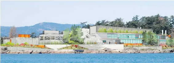  ??  ?? An artist’s rendering of the sewage-treatment plant coming to McLoughlin Point in Esquimalt.