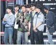  ??  ?? BTS accepts an award onstage at the Billboard Music Awards.