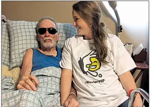  ?? Arkansas Democrat-Gazette/EMMA PETTIT ?? Randi Haley sits with her father, Tommy Harris, at his home in Hope late last month. Harris was diagnosed with progressiv­e supranucle­ar palsy in 2013.