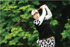  ?? ?? ANN ARBOR: Shanshan Feng of China watches her drive on the fourth hole during the second round of the LPGA Volvik Championsh­ip on Saturday at Travis Pointe Country Club Ann Arbor, Michigan. — AFP