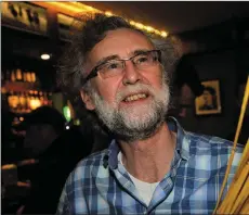  ??  ?? Pat Doyle (above) and Billy Grandfield (left) working on the Sráid Eoin straws in the Barrack Height pub on Friday night.