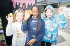  ?? ?? Keira Patterson, 9, (left) Tafadzwa Chiwawa, 10, and Hariette Chrighton-casey, 10, at their stall.