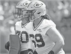  ?? DAN POWERS/USA TODAY NETWORK-WISCONSIN ?? Packers tackle Dennis Kelly (69) will help fill in for the injured David Bakhtiari, whose number he borrowed Thursday.