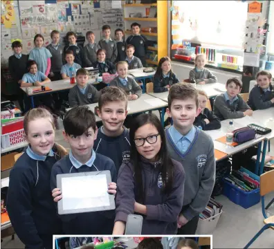  ?? Left: Eva Lane, Ger McElligott, Simone Pasini and Tea Arsenic also from fourth class at St John’s National School ?? Above: Freya Dale, Joe Hickey, Robbie Guest, Thien Doran and Mí chéal O’Mahony fourth class at St John’s National School, Kenmare with their classmates